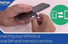 sim card into dual memory tray inserting