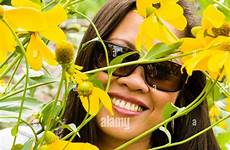 filipina sunglasses framed smiling alamy wearing designer yellow face