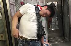 sleeping standing japanese train