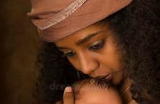 baby mother ethiopian her kissing stock