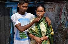 mother prostitute teen indian his sex kolkata rajib train he india boy slumdog slum man teenager midfielder women family manchester