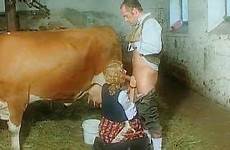 cow milking sucking farmer bushes flyflv