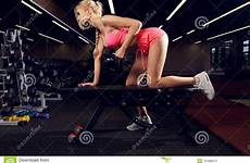 dumbbell bent row over bench arm performing woman preview