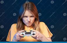 serious joystick determined playing game girl closeup