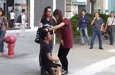 boyfriend girl slapping over girlfriend arrested slapped forcing beating police knees hong kong kowloon his slap her south china tough
