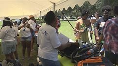 Tallahassee woman hosts first community giveaway, distributes more than 500 backpacks for kids