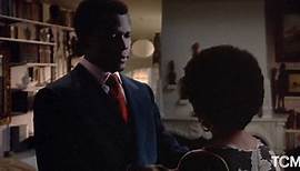Sidney Poitier and Esther Anderson in A WARM DECEMBER