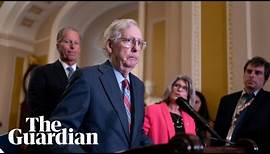 Republican Senate leader Mitch McConnell freezes during remarks to reporters