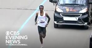 Ethiopia's Tamirat Tola sets record in New York City Marathon's men's race