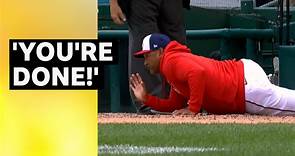 MLB: Washington Nationals manager Dave Martinez goes to ground after being ejected