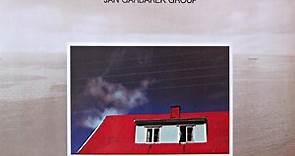 Jan Garbarek Group - Photo With Blue Sky, White Cloud, Wires, Windows And A Red Roof