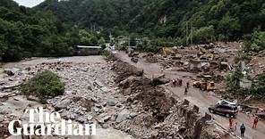 Heavy rains trigger deadly mudslide in north-west China
