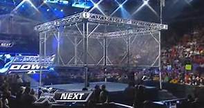 WWE SmackDown 1/15/10 Batista vs Rey Mysterio - Steel Cage Match Part 1/2 HQ