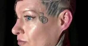 Woman gets tattoo covering half of her face