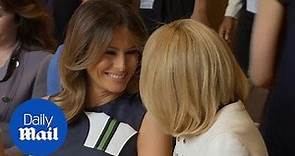Melania Trump chats cheerfully with Brigitte Macron in Brussels