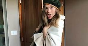 Suki Waterhouse larks around at home and accessorises a blanket