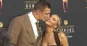 Rob Gronkowski kisses Camille Kostek on NFL Honors red carpet