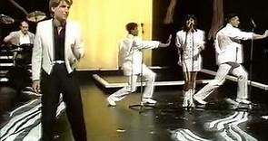 Athele Mentor Neil Danns performs as a backing dancer at 1987 Eurovision