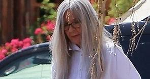 Diane Keaton, 75, is unrecognisable as she wears a long wig to film Mack & Rita