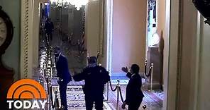 Hero Officer Eugene Goodman Directs Mitt Romney To Safety In Capitol Riot Video | TODAY