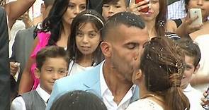 Carlos Tevez is showered with confetti after tying the knot