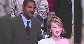 Maurice Cheeks helps Natalie Gilbert sing the National Anthem at Trail Blazers game