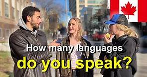 How many languages do Canadians speak?