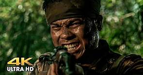 Casey (Scott Adkins) stumbles upon a patrol in the jungle. Ninja: Shadow of a Tear