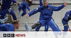 World's first disabled astronaut takes part in flying exercise - BBC News