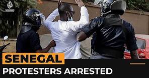Arrests within hundreds of Senegalese protestors after election postponed
