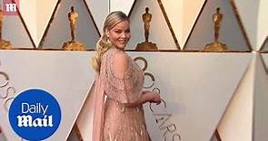 Abbie Cornish in a plunging gold gown at 2018 Oscars red carpet - Daily Mail