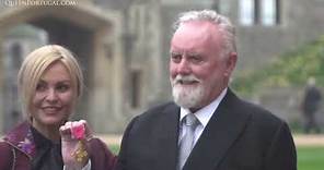 Roger Taylor and His Wife Sarina - Picture Taking With His OBE Awards