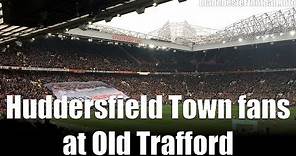 Huddersfield Town fans sing at Old Trafford