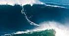 Hawaiian surfer breaks world record for catching biggest wave – video