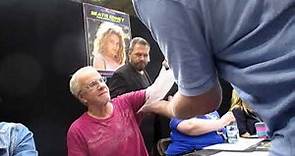 Christopher Lambert signing autographs