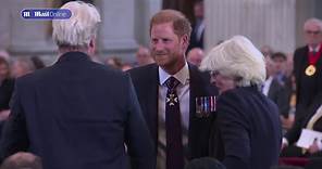 Prince Harry chats with his uncle Earl Spencer at Invictus ceremony