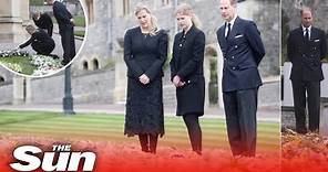 Mournful Prince Edward & Sophie view floral tributes to Philip outside Windsor