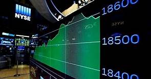 Dow Jones surges to record high