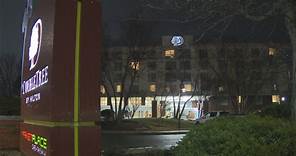 Suspect in custody after 4 people found stabbed at Dorchester hotel