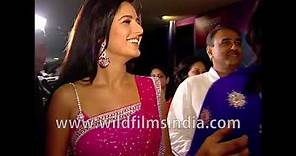 Katrina Kaif in younger years, in bright pink saree with white edging, at Race movie premiere night