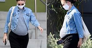 Rooney Mara shows her growing baby bump as she goes for a walk in Los Angeles