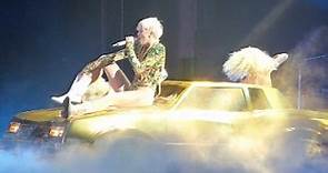 Miley Cyrus plays to the crowd during Bangerz Tour