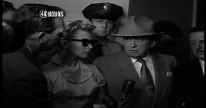 Lana Turner addresses reporters