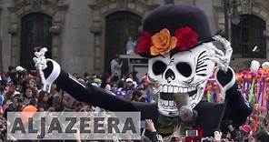 Mexicans celebrate first Day of the Dead procession