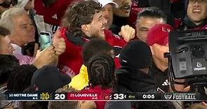 Jack Harlow among Louisville fans that rush the field after beating Notre Dame
