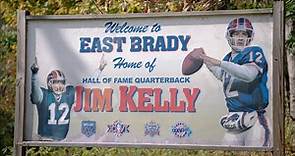 Jim Kelly Delivers Gold Football To East Brady HS