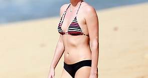 Charlize Theron Flaunts Washboard Abs in Tiny Bikini—Check It Out! - E! Online