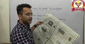 how to read news paper