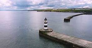 Seaham harbour and lighthouse: 4k cinematic drone footage circling iconic lighthouse