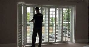 How track mounted window shutters are opened